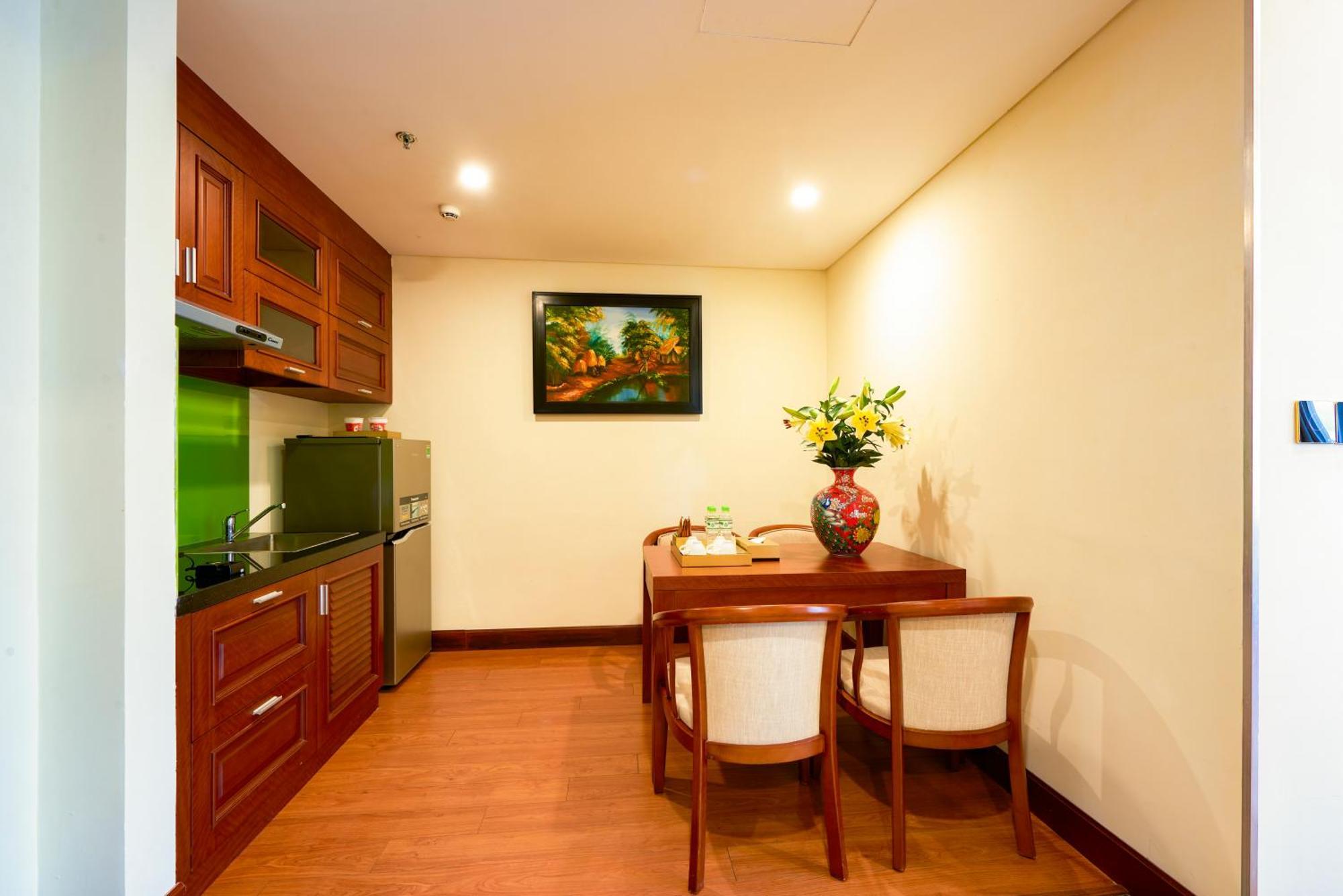 Dlg Hotel Danang Экстерьер фото A kitchen in a serviced apartment in Ho Chi Minh City, Vietnam